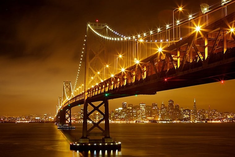 The Bay Bridge in San Francisco, which carries about 270,000 vehicles each day, opened in 1936.